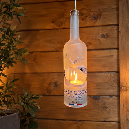 Hanging lamp made from a recycled vodka bottle