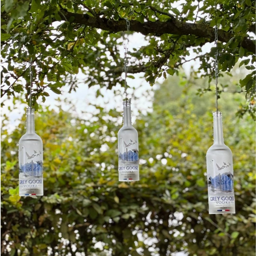 Hanging lamp made from a recycled vodka bottle